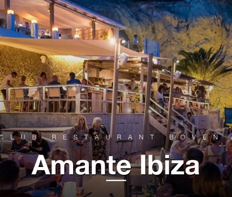 Amante beach-club restaurant boven Sol d'en Serra, Ibiza, met kaarsen en avond-sfeer