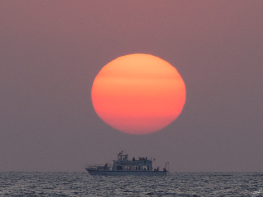 Iconische zonsondergang aan de westkust van Ibiza