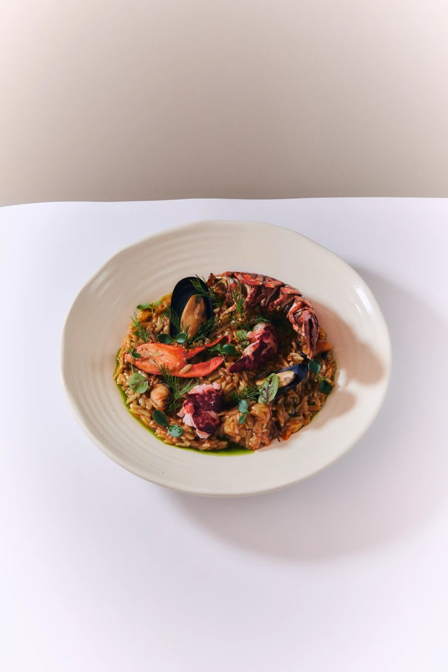 NU Mallorca: beachclub en restaurant op Playa de Muro (baai van Alcúdia) 3 Een rijstgerecht met zeevruchten bij NU Mallorca op Playa de Muro