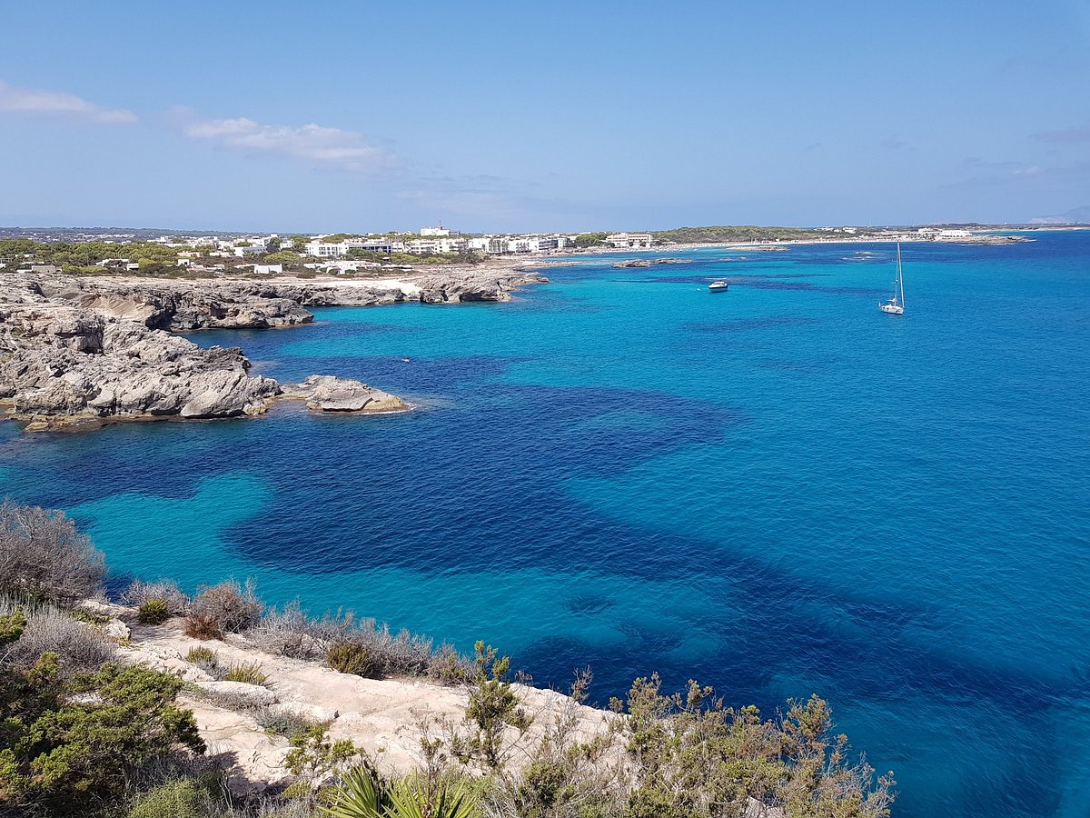 Punta Prima Formentera: wachttoren, zonsondergang en zwemmen vanaf de rotsen 2 Punta Prima Formentera, foto 1