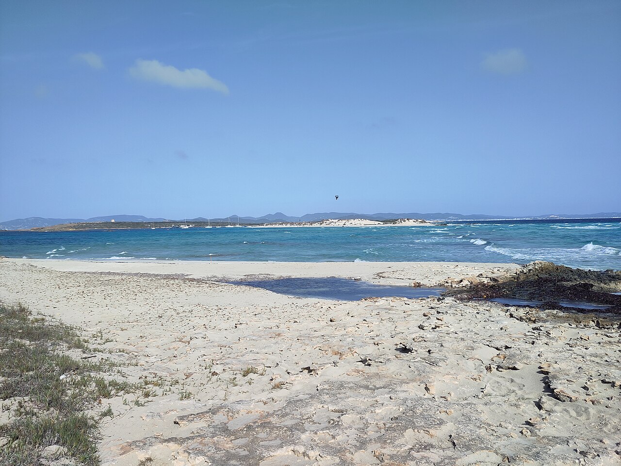 Es Trucadors Formentera: de landtong met zee aan twee kanten 5 Het einde van de punt van Es Trucadors met Espalmador aan de overkant van het zeegat